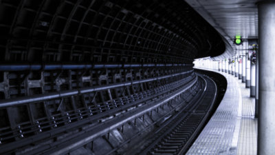 You can see an empty platform and tracks leading around the corner, pointing the way to the future.