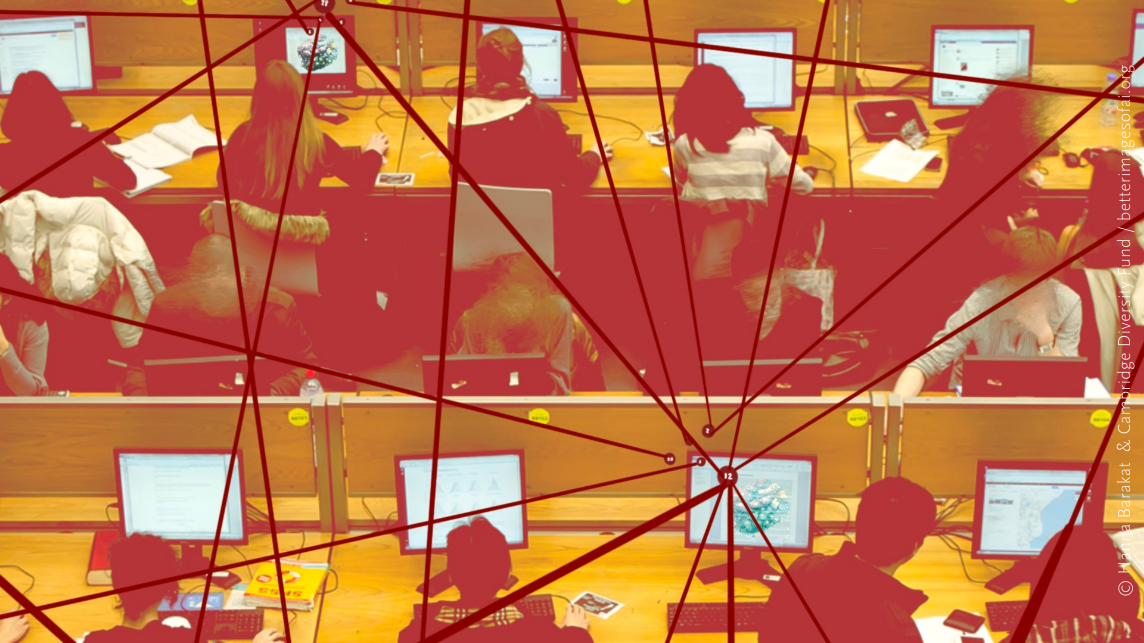 A computer lab with three rows of four desks, each occupied by students working at computers. Overlaying the computer lab are red lines connecting through nodes, symbolizing the flow of communication, data exchange, and interconnected networks.