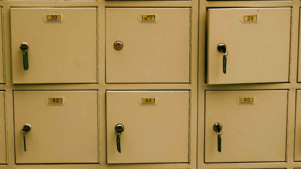 The photo shows yellow lockers, symbolising data protection.