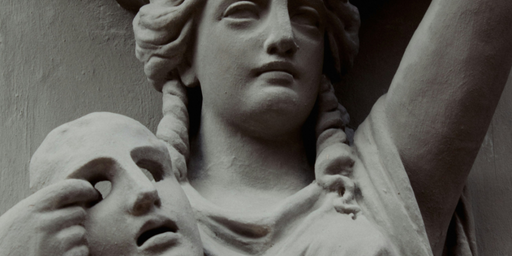 Antique stone statue of a woman holding a mask, symbolising the stolen identities and loss of consent in deepfake pornography."** Let me know if you'd like it adjusted for a specific platform or audience.