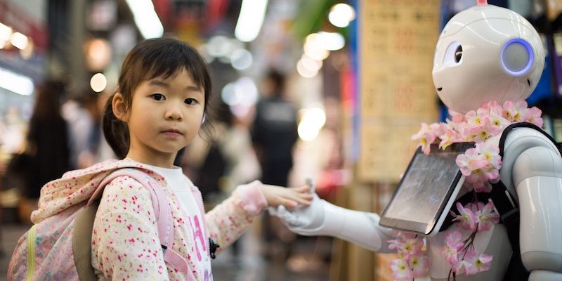 andy-kelly-402111 Robot and girl holding hands